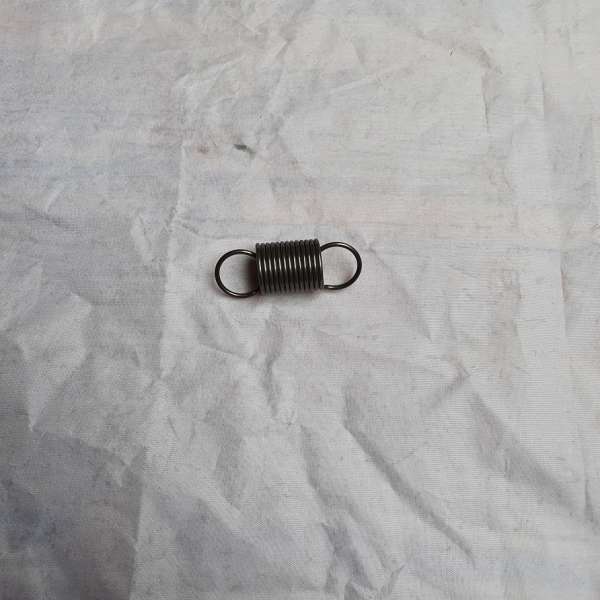 DRIVE TENSION SPRING